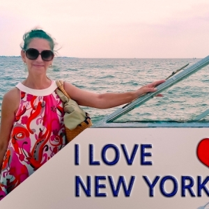woman with i love new york sign